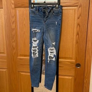 American Eagle Outfitters Size 4 Next Level Stretch Distressed Jean